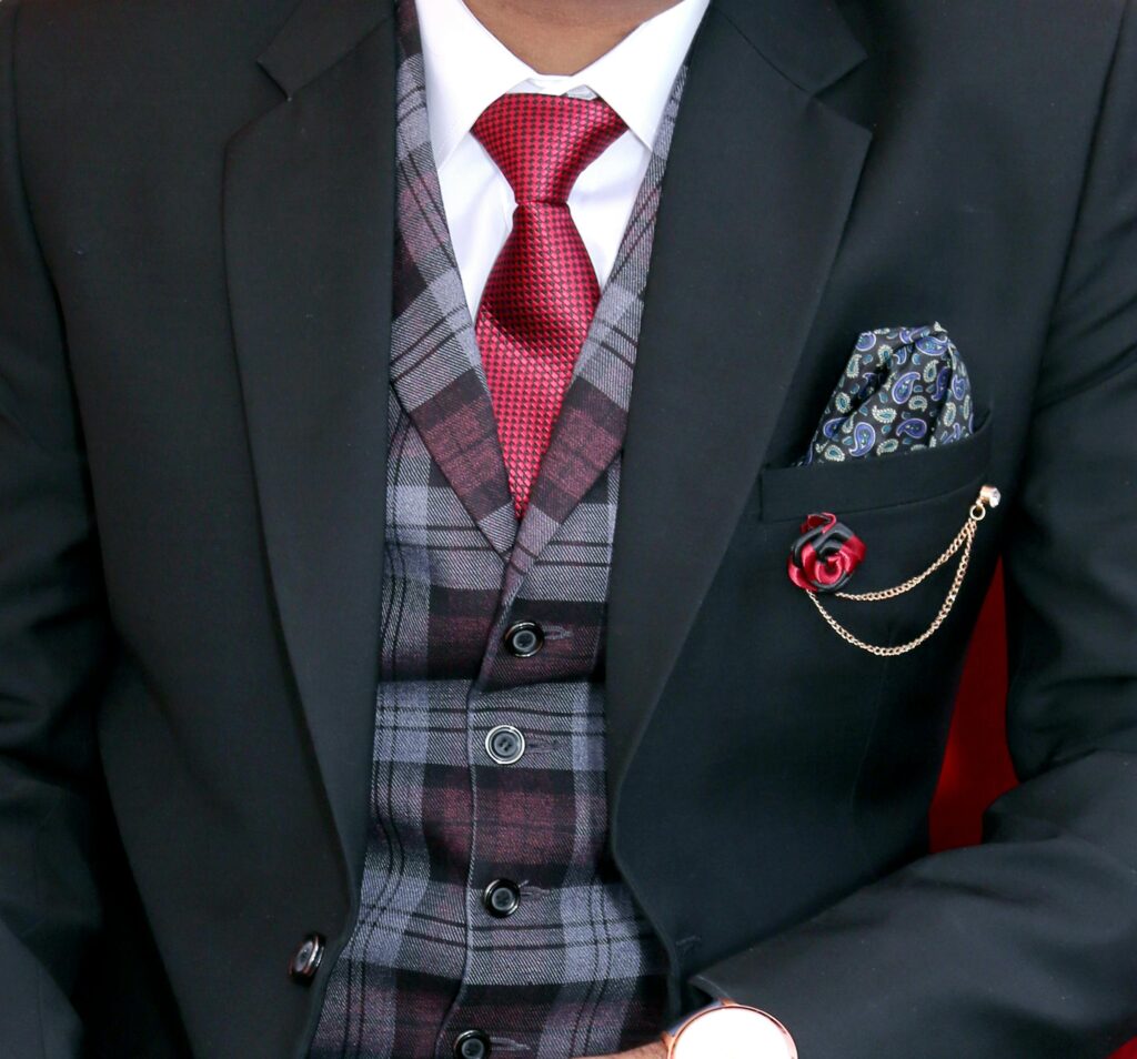 Man Wearing Black Notched Lapel Suit Jacket